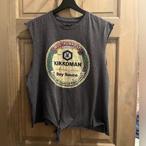 Cut off sleeve Kikkoman shirt. Why? I don’t know.